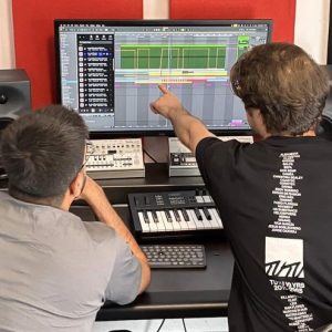 Music production courses London – students learning production techniques with Ableton Live at London AMP